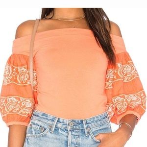 Coral Free People top with embroidered sleeves